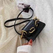 Stone chain cross-body bag