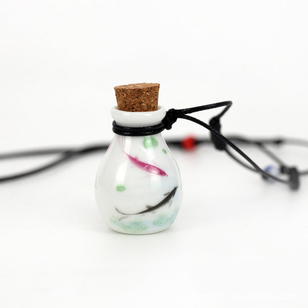 Perfume bottle necklace